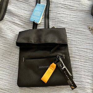 Super cute SHERPANI Crossbody NEW WITH TAGS with a black and gray strap
